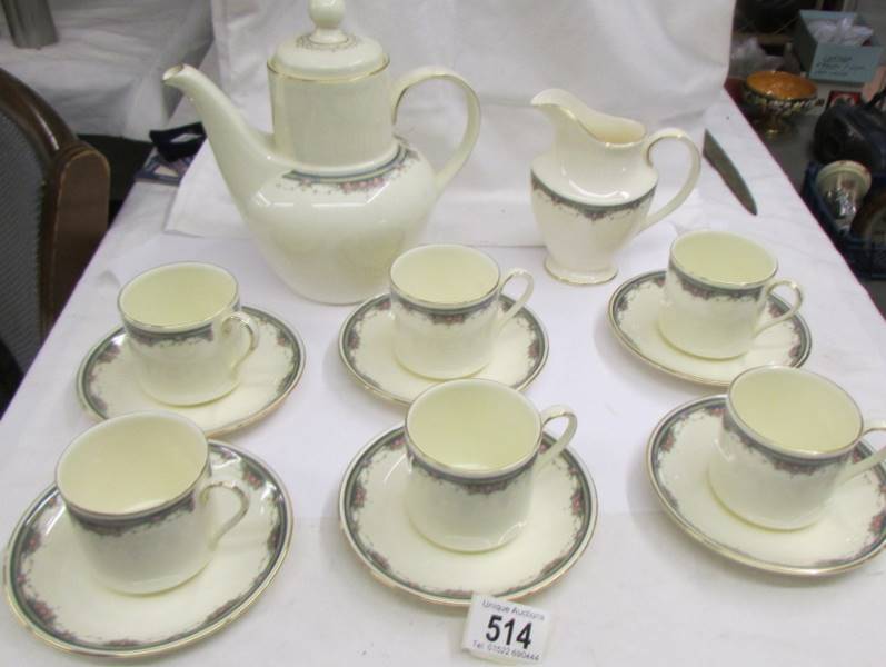 A Royal Doulton 'Albany' pattern coffee set (missing sugar bowl).