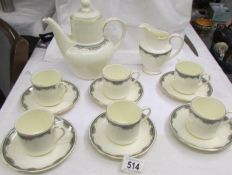 A Royal Doulton 'Albany' pattern coffee set (missing sugar bowl).