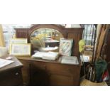 A mahogany mirror backed sideboard.