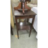 A mahogany occasional table.