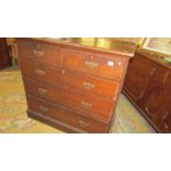 A two over three mahogany chest of drawers.