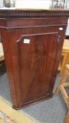 A good quality mahogany corner cupboard.