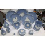 Fourteen pieces of blue Wedgwood Jasper ware.