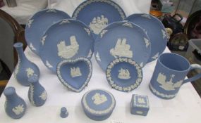 Fourteen pieces of blue Wedgwood Jasper ware.