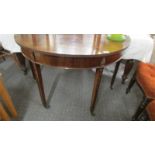 A Regency style mahogany 'D' end table.