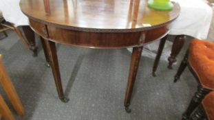 A Regency style mahogany 'D' end table.