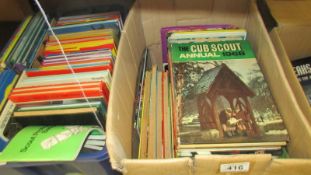 Two boxes of Scouting related books.