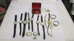 A mixed lot of wrist watches including two Mickey Mouse.