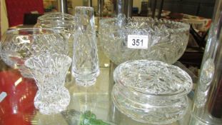 A cut glass bowl, rose bowl, small bowl and 2 vases.