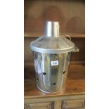 A new stainless steel bin with funnel lid.