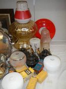 A mixed lot of glass lamp shades, lamp wicks etc.