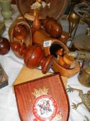 A mixed lot of wooden items including bowl, clogs etc.