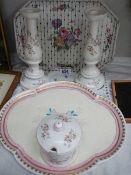 Three porcelain trays and a pair of candlesticks.