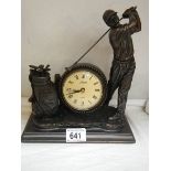 A golf related mantel clock.