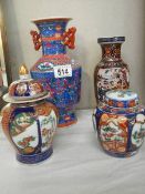 Two mid 20th century oriental vases and two ginger jars (on lid a/f).