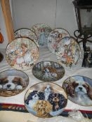 A quantity of collector's plates including dogs.