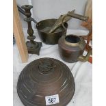 A mixed lot of brass and copper including brass saucepan, hot water bottle etc.