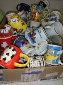 A box of assorted mugs.