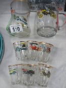 A set of six shot glasses and two others all decorated with vintage cars.
