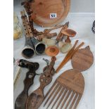 A mixed lot of wooden items including bread board.