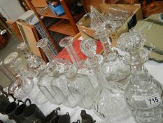 Eleven glass decanters, three missing stoppers.