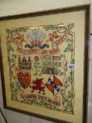 A framed and glazed cross stitch for wedding of Charles and Diana.