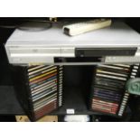 A DVD player and a quantity of CD's.