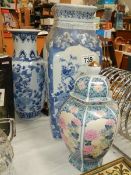 Two blue and white vases and a ginger jar.