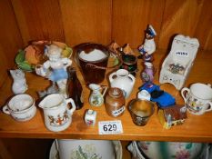 A mixed lot of miniature collectables.