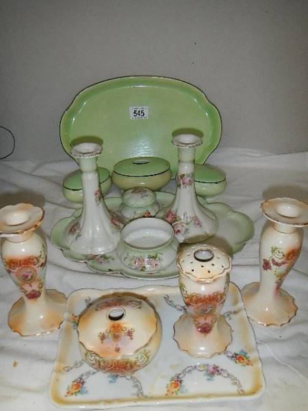 Two ceramic dressing table sets.