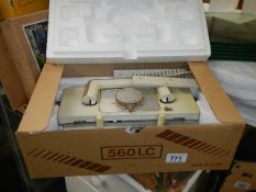 A boxed vintage Knitmaster knitting machine.