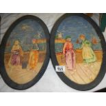 A pair of Bretby Dutch scene wall plaques.