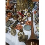 A mixed lot of brass and copper including hunting horn, primus stove, blow lamp etc/.