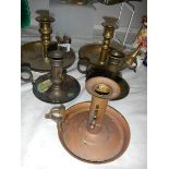 Five chamber candlesticks.