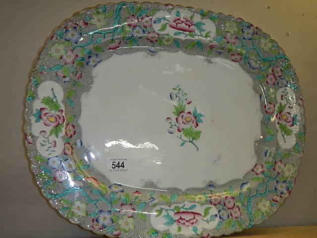 A floral decorated meat platter. ****Condition report**** N.