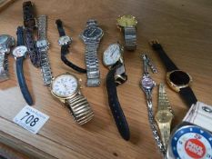 A mixed lot of ladies and gents wrist watches.