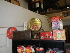 A mixed lot of vintage tins.