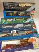 Six boxed die cast model sets.