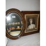 An oval mirror and a study of a young lady.