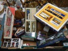 A large box of assorted die cast vehicles.