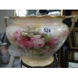 A Victorian rose decorated jardiniere.
