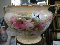 A Victorian rose decorated jardiniere.