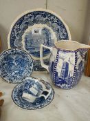 A mixed lot of blue and white including jug, plates etc.