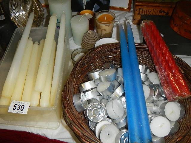 A mixed lot of assorted candles.