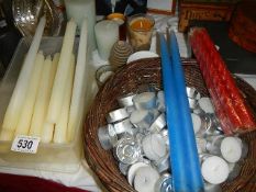 A mixed lot of assorted candles.