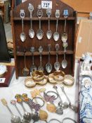 A mixed lot of souvenir spoons, napkin rings etc.