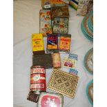 A mixed lot of old collector's tins.