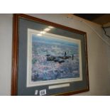 A framed and glazed print entitled 'Lancaster over Lincoln'.