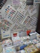 A huge lot of assorted postage stamps.
