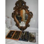 A mixed lot of geometry implements and a gilt framed mirror.